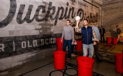 People play patio pong at Pins.